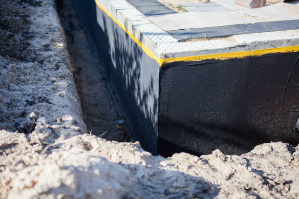Professional Waterproofing technician working in Sparta, MI